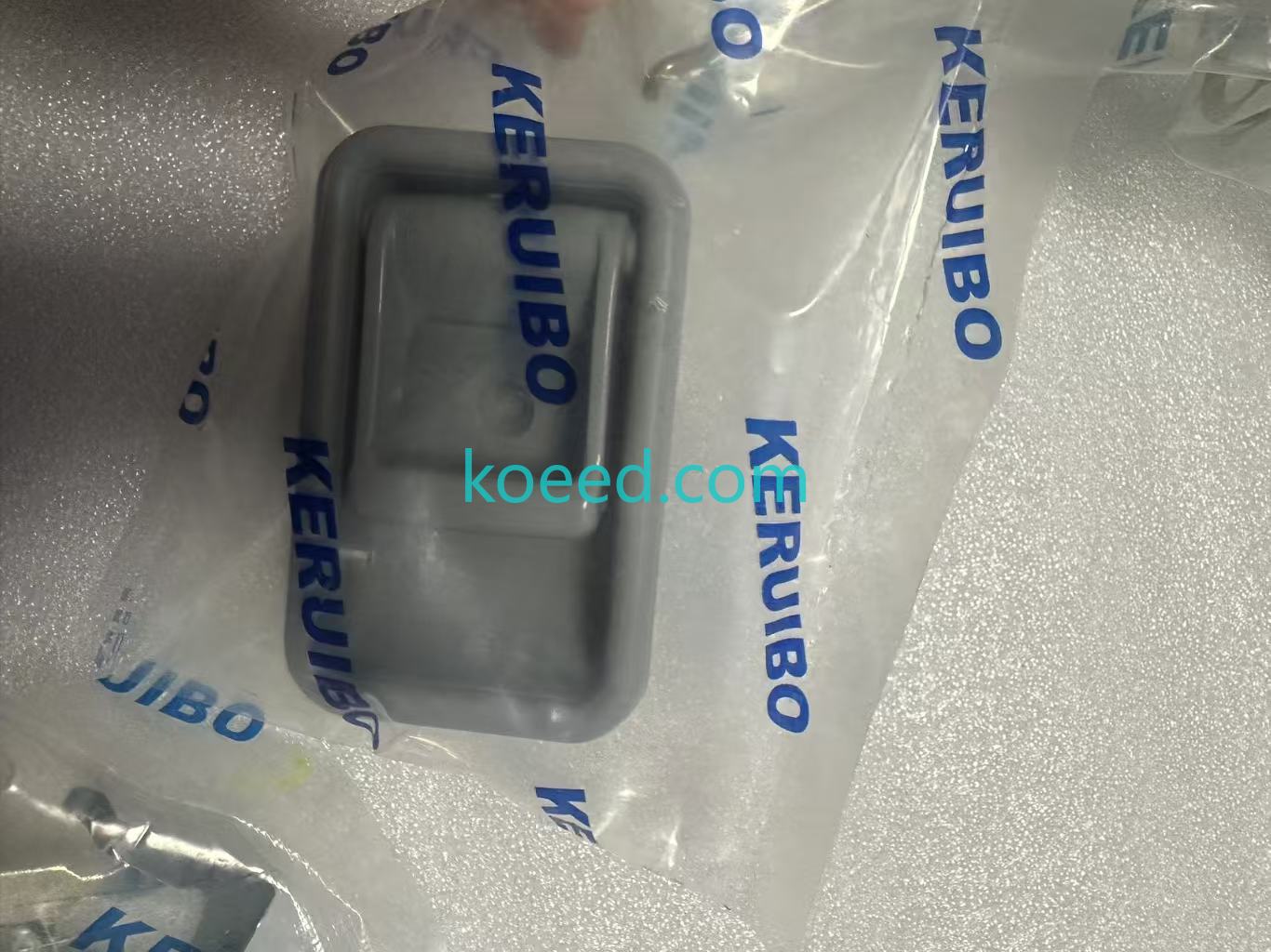 Kobelco cab door lock assembly installation view