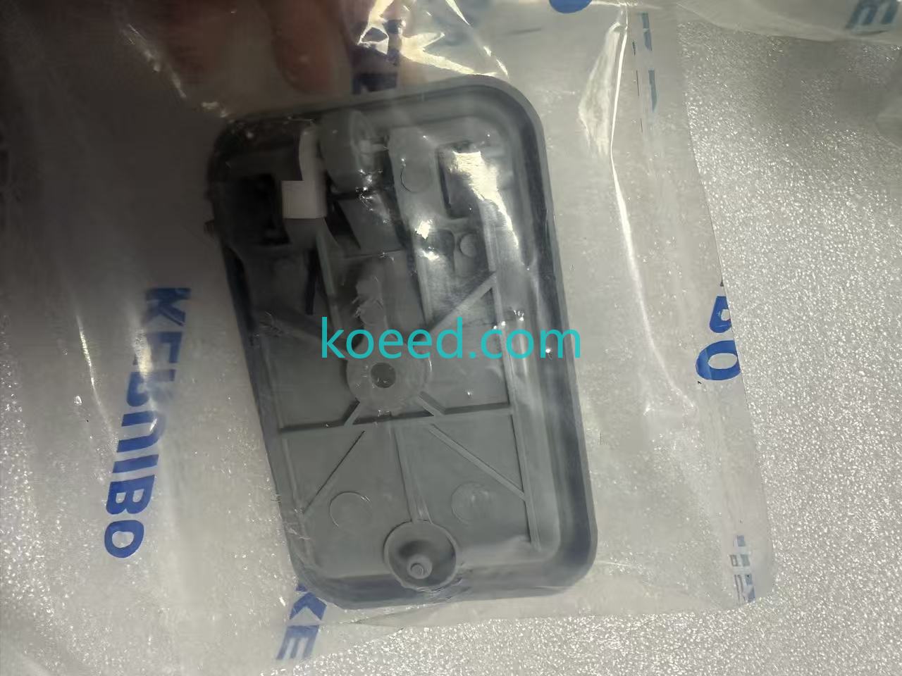 Kobelco cab door lock assembly packaging