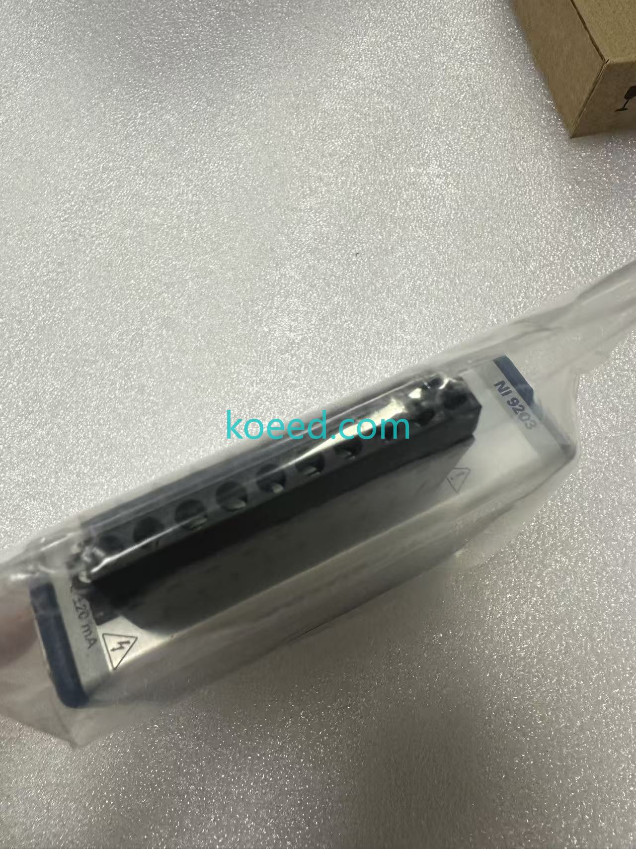 NI 9203 side profile showing C Series chassis connector