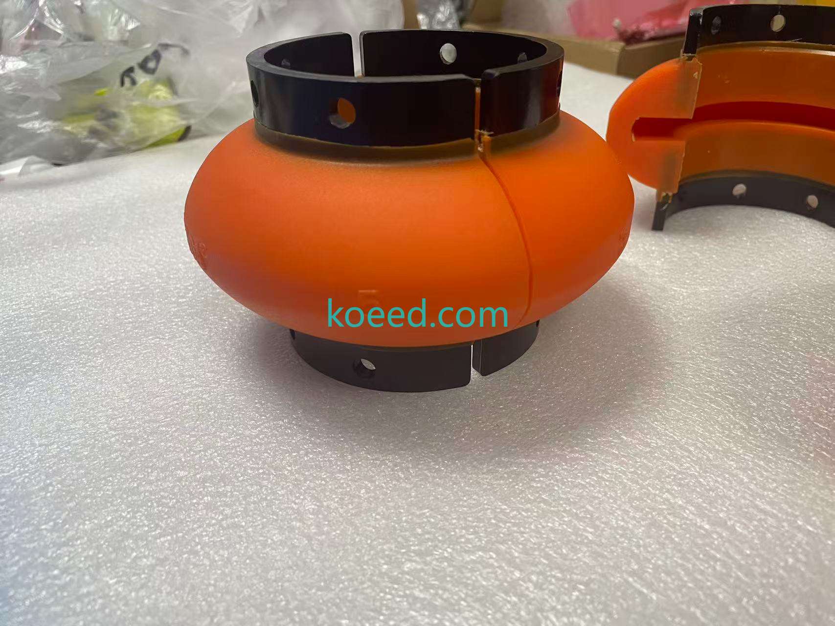 OMEGA E5 elastomeric element — polyurethane material close-up