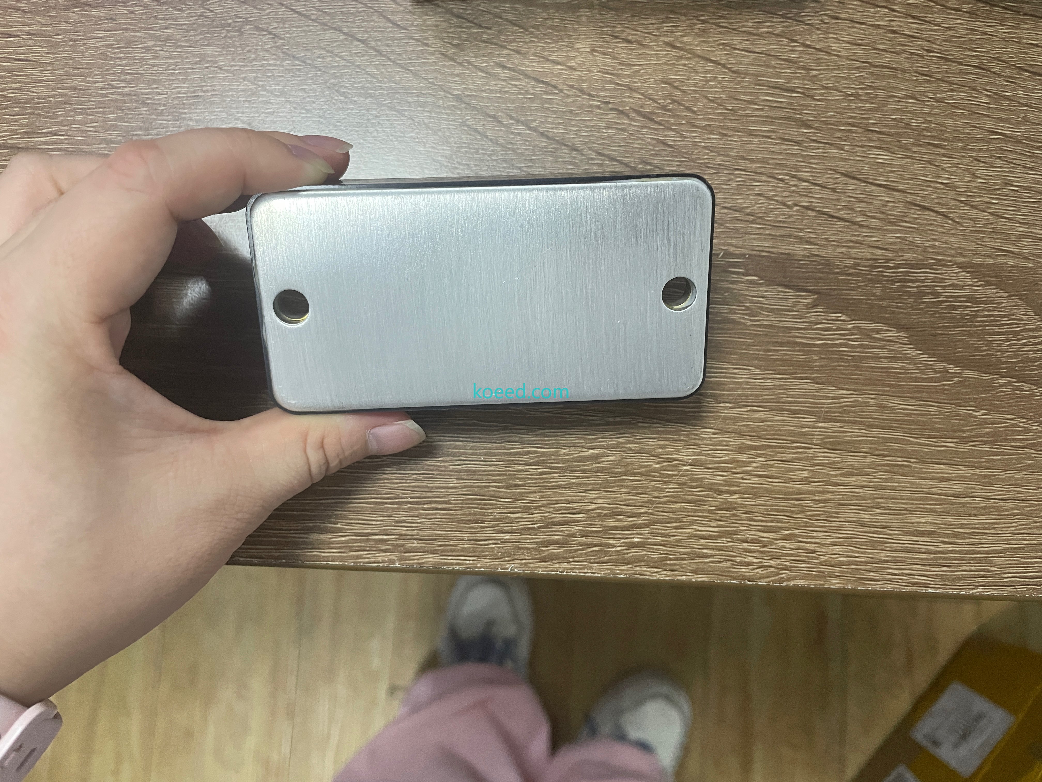 NIEC PDMB200E6 — bottom view of the base plate and mounting holes