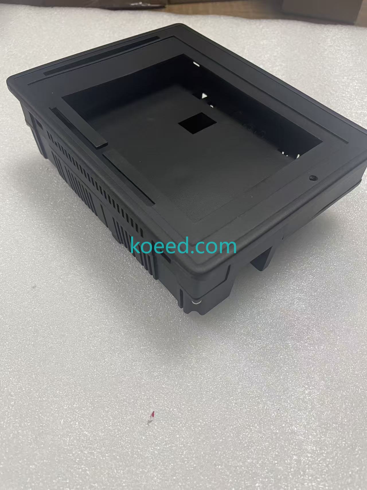 FANUC teach pendant housing shell - surface finish closeup