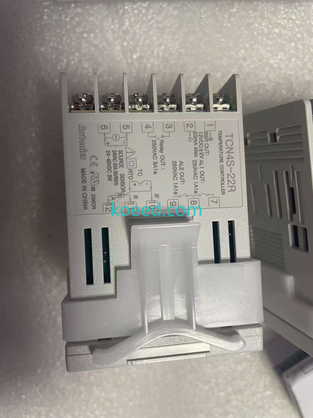 Autonics TCN4S-22R side label with a printed wiring diagram and supply information.